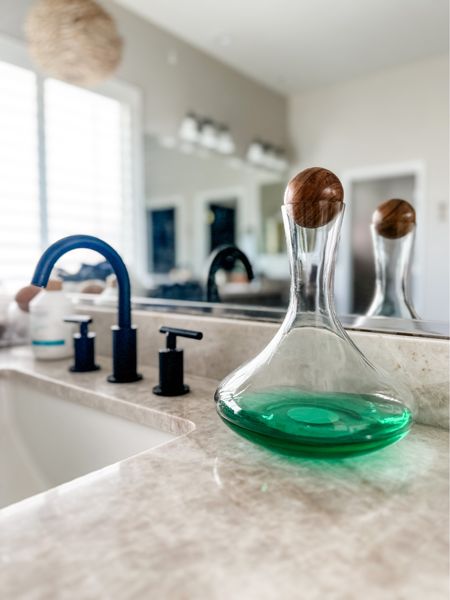 This cute jar isn’t intended for mouthwash I’m sure… but it worked perfectly and adds such a prettiness to our bathroom sink!  ALSO, I’m linking the other items I used in todays vid!

#LTKfindsunder50 #LTKhome