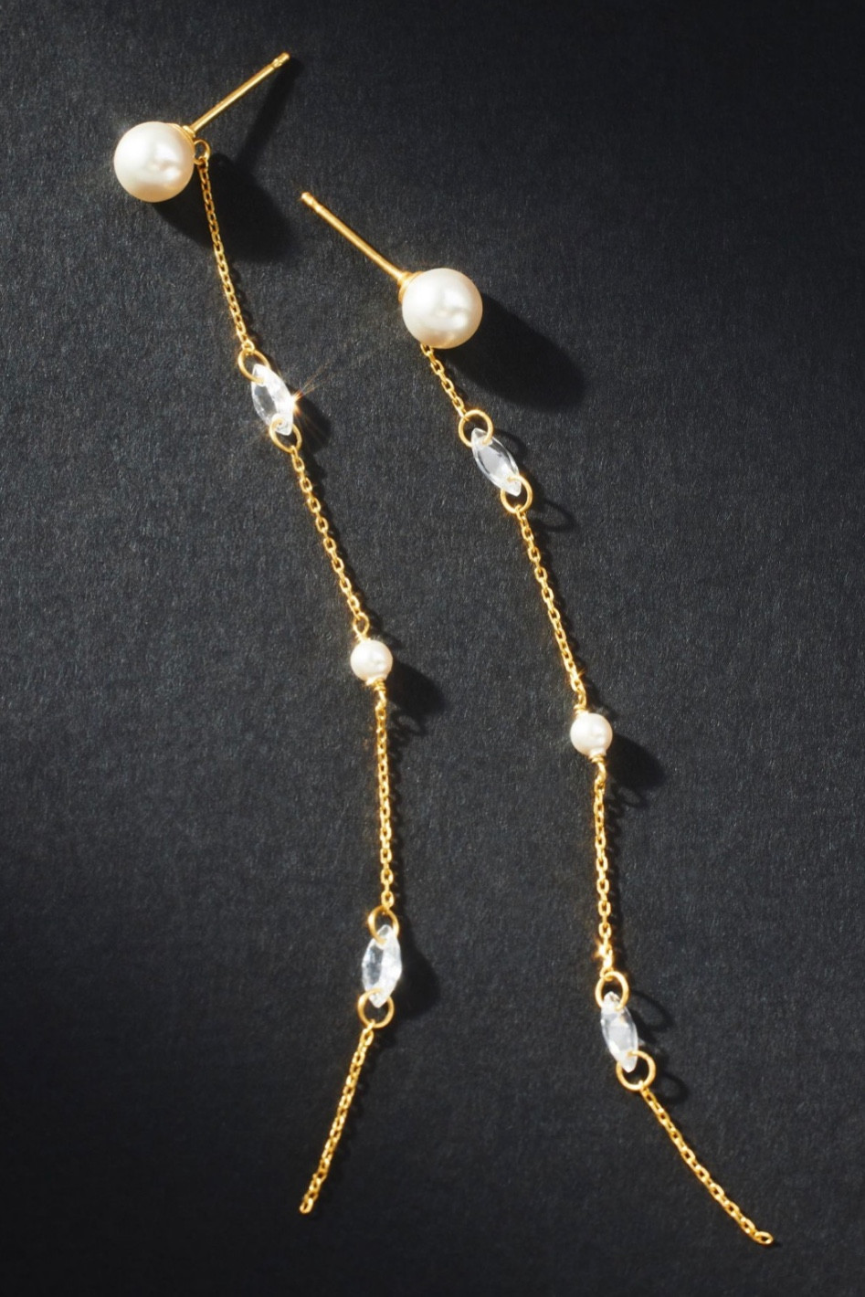 Drop earrings, pearl earrings, gold jewelry, gold earrings, statement earrings, statement jewelry, dangly earrings, gold necklace, holiday jewelry, holiday earrings

#LTKstyletip #LTKbeauty #LTKHoliday