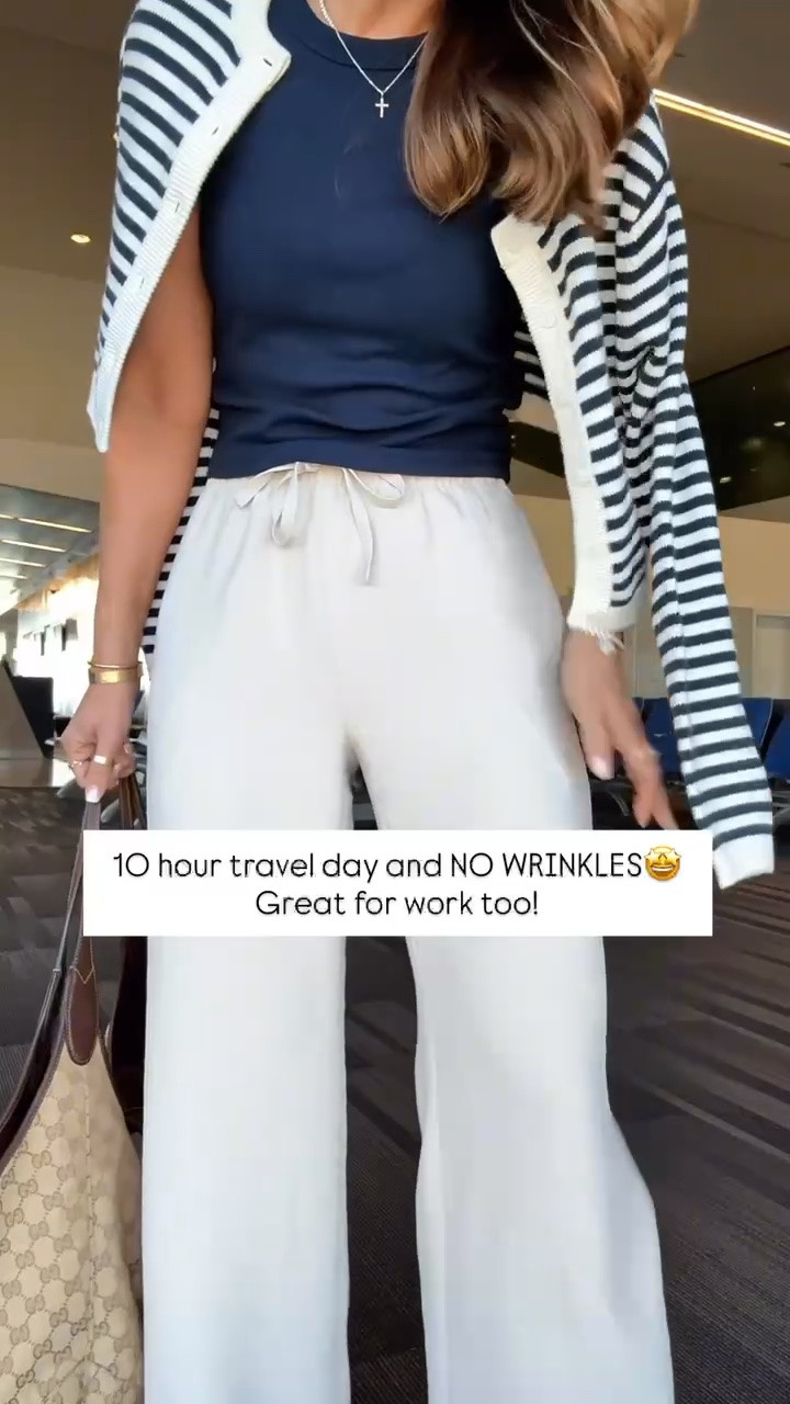 My travel outfit of the day! Aritzia The Lodge Pant - Crepette. Size XS regular, but I prefer short (I ended up comparing the 2). Comes in short and tall, too. Wrinkle resistant with an elastic waist and high-rise. Aritzia t-shirt in XS. Aritzia striped cropped cardigan in 2XS. Jelly ballet flats are whole sizes only. I’m a 6.5 and sized down to a 6 per reviews. Business casual. Elevated casual. Workwear. Coastal outfit.

#LTKootd #LTKTravel #LTKWorkwear
