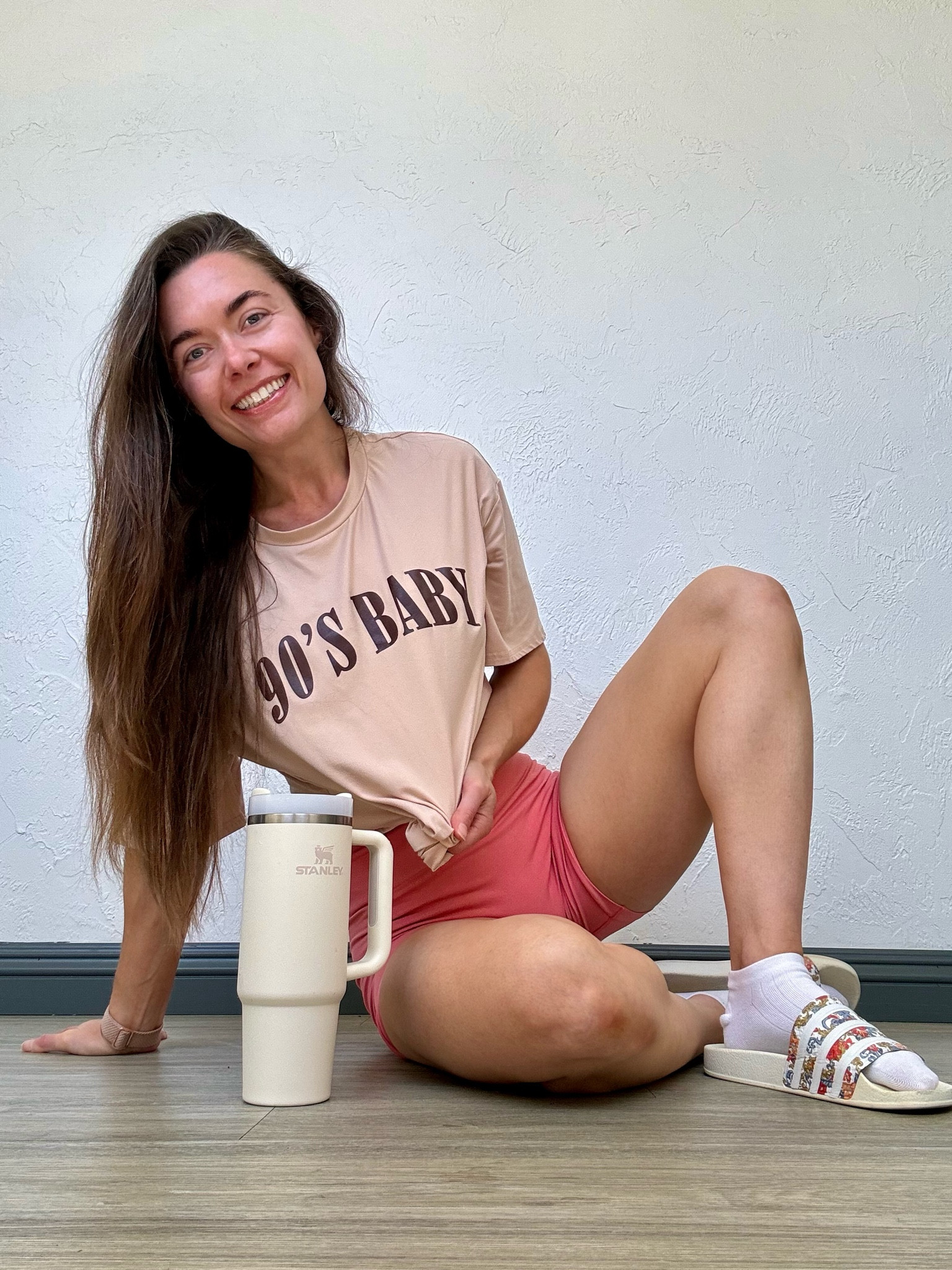 90’s Baby signing in with this comfy and casual workout outfit! 🫶🏻 

I'm wearing a size small in the oversized graphic tee and shorts. Adidas slides are true to size. Enjoy! X

#LTKActive #LTKstyletip #LTKfindsunder50