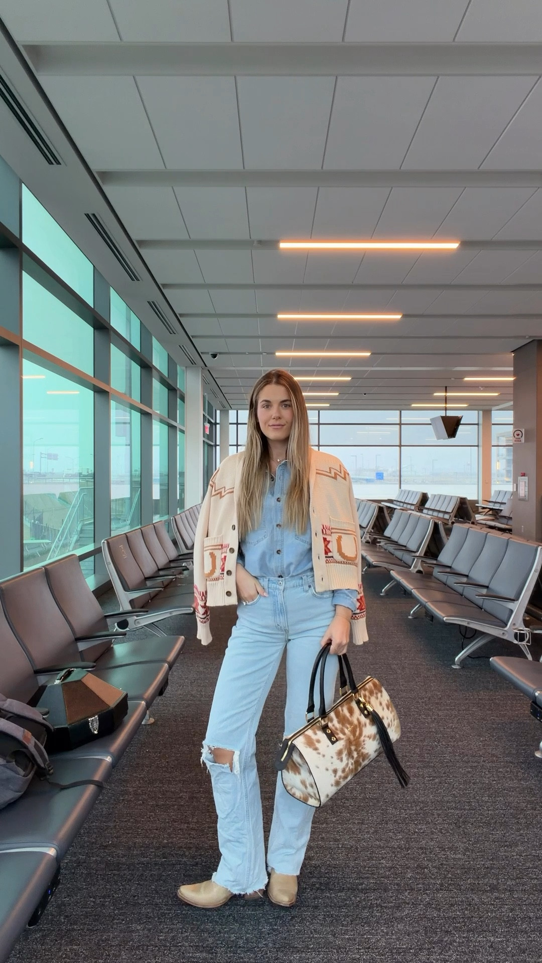 airport outfit for houston, tx - rodeo bound! 
26/extra tall in jeans, medium in amazon top, bag is kelly tools, code KIRA10 for boots, size small in cardigan 

#LTKgrwm #LTKTravel #LTKTall