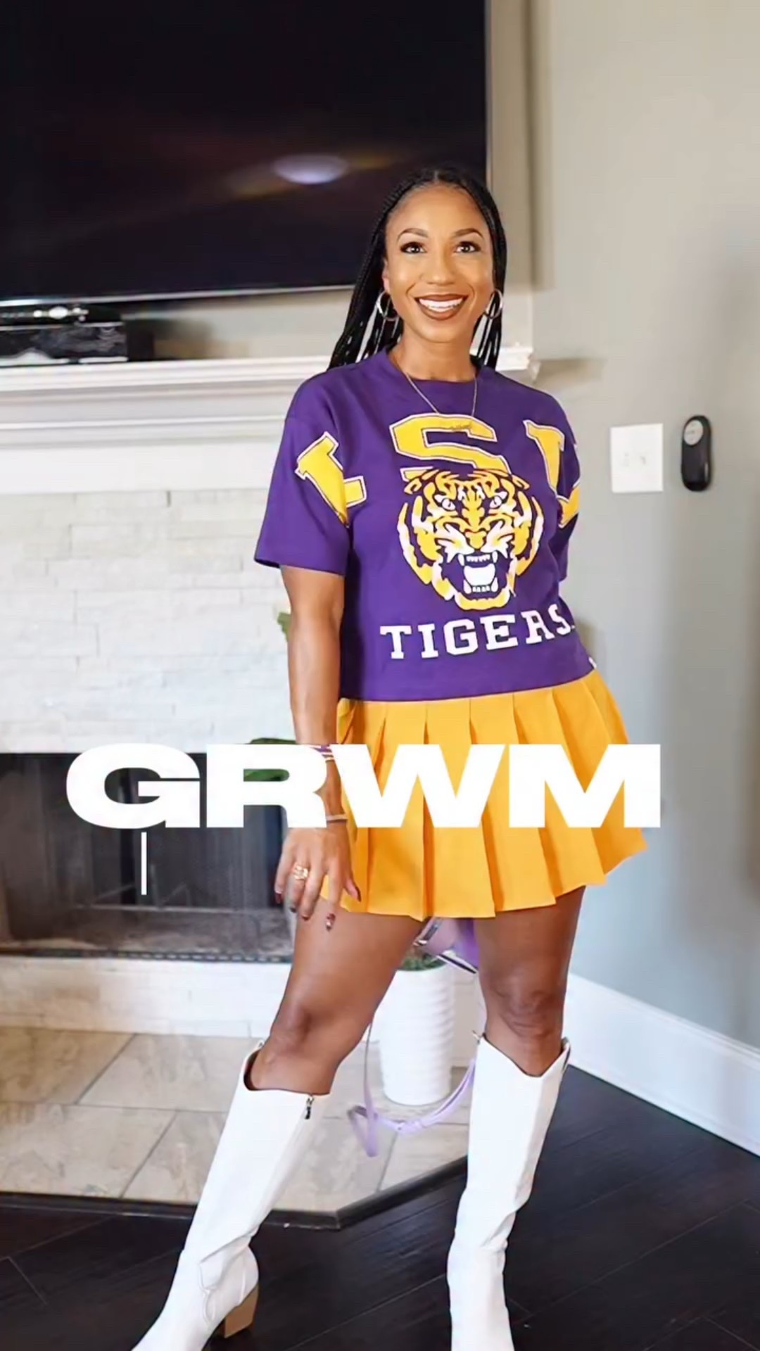 #GRWM to beat the Gators! 💜💛 Geaux Tigers!

Top: @alumnihalllsu 
Skirt: @amazonfashion 
Boots: @amazonfashion 
Bag: @casemate 
Earrings: @oldnavy 
 
#beingjustmelody #lsufootball #geauxtigers