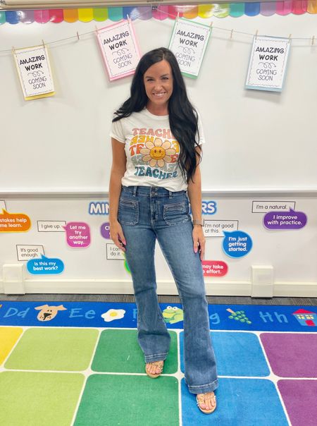 Welcome weekend, I’m so happy to see you😍🥳 #tiredteacher 😴 I shared a whole bunch of my most-used classroom favorites on my stories today! (Saved in my “teaching” highlight bubble if you missed it!)

My jeans are old, but Loft is selling an almost identical pair!! Linking them up along with my groovy teacher tee! (I’m in my usual size S.)

#LTKBacktoSchool #LTKunder50 #LTKsalealert