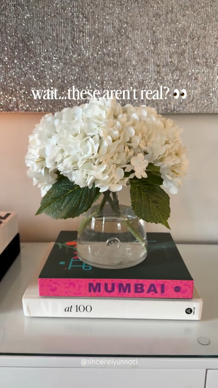 I had to do a double take…because why do these look this real?! 👀

If you love fresh flowers but hate the upkeep, these faux hydrangeas are such a good find! No watering, no wilting, and they instantly make any space feel styled and elevated 🤍

Comment SHOP and I’ll send you the link!

Save this for your next little home refresh ✨
.
.
.
#homedecorideas #neutralhome #fauxflowers #homestyling #coffeetabledecor | Amazon finds, faux hydrangeas, realistic faux flowers, home decor styling, coffee table decor, entryway styling, neutral home decor, vase styling ideas, spring home refresh | @westelm @heirloomcities @amazon @target @simplehuman @anthropologiehome @shopmy @ltk.home @arhaus @everlastingcandle @geometry.house