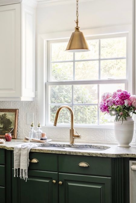 Best way to declutter around a kitchen sink! Add a bathroom vanity tray and two separate soap dispensers for hand soap and dish soap. It’s the little things… #kitchen #kitchendecor #kitchensink #organizing #organization #cottagestyle 


#LTKSeasonal #LTKstyletip #LTKhome