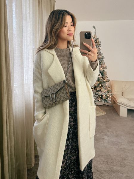 Jenni Kayne sweater under an Abercrombie cream coat with a Madewell floral maxi skirt and western booties!

Top: XXS/XS
Bottoms: 00/0
Shoes: 6

#winter
#winteroutfits
#winterfashion
#winterstyle
#holiday
#giftsforher
#jennikayne
#abercrombie
#madewell
#gucci

#LTKHoliday #LTKstyletip #LTKSeasonal