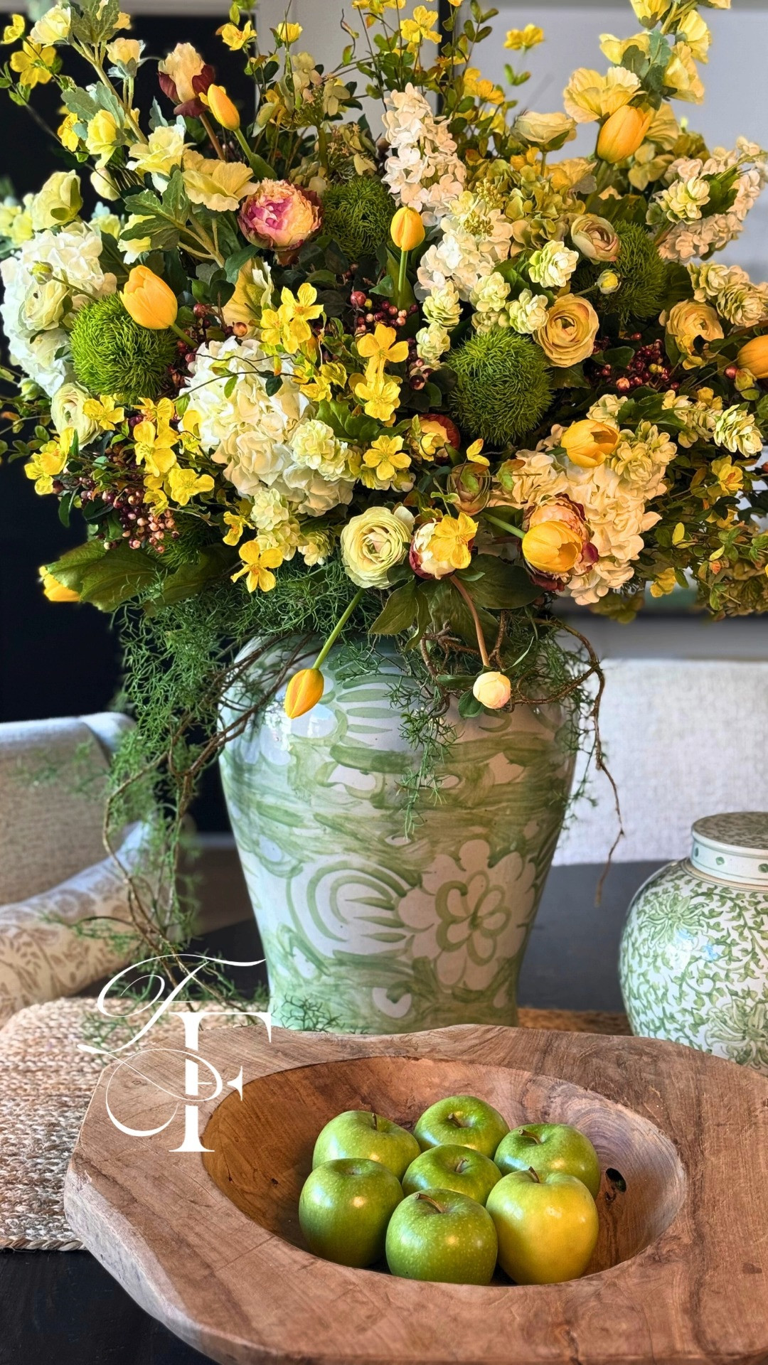 Spring faux flower arrangement with pops of yellow flowers. Perfect spring decor for your house. 

 #LTKdayinmylife #LTKSeasonal #LTKHome