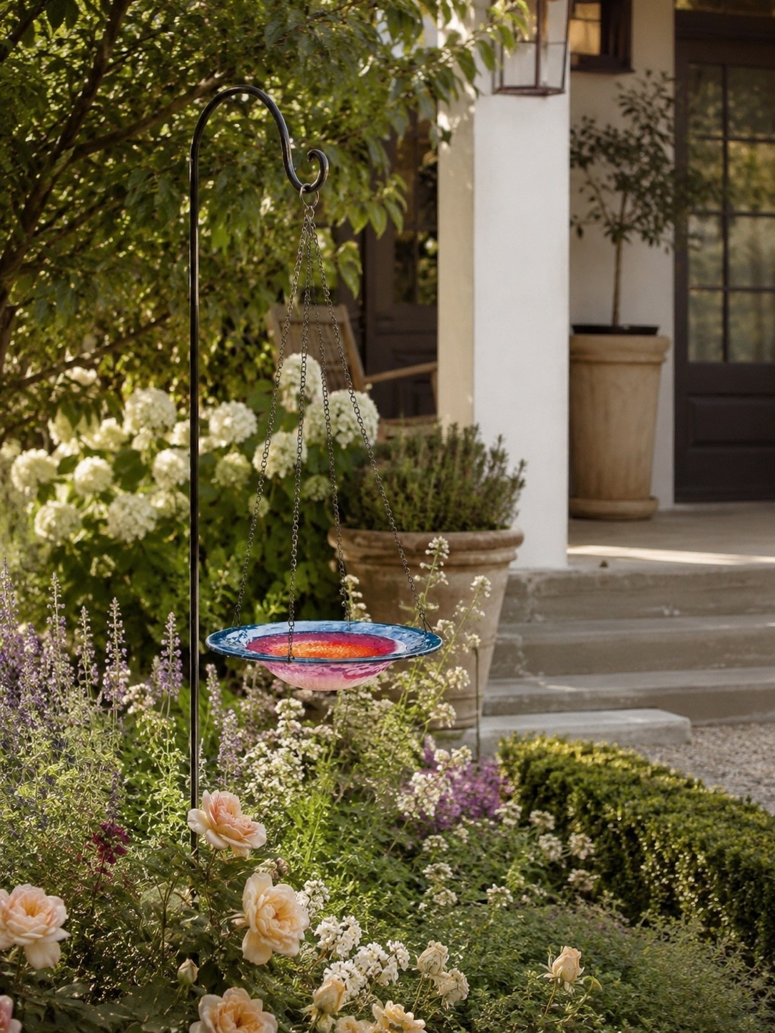 Garden Charm 🌿✨

This little garden moment feels straight out of a storybook 🤍 The colorful hanging bird bath surrounded by blooming roses, soft greenery, and layered florals creates such a peaceful and welcoming outdoor space. I love how the black iron hook adds the perfect touch of contrast while still keeping everything timeless, cozy, and elegant ✨

Linking all my favorite garden decor and outdoor finds on LTK 🌸

Follow @farmtotablecreations on Instagram for more cozy outdoor spaces and elevated home inspiration ✨

#LTKHome #GardenDecor #OutdoorLiving #CottageGarden #FrontPorchDecor #GardenInspo #CozyHome #OutdoorStyling #ModernFarmhouse #BackyardGoals #FloralGarden #HomeInspo #OutdoorDecor #LTKStyle #GardenStyle

#LTKHome #LTKSaleAlert