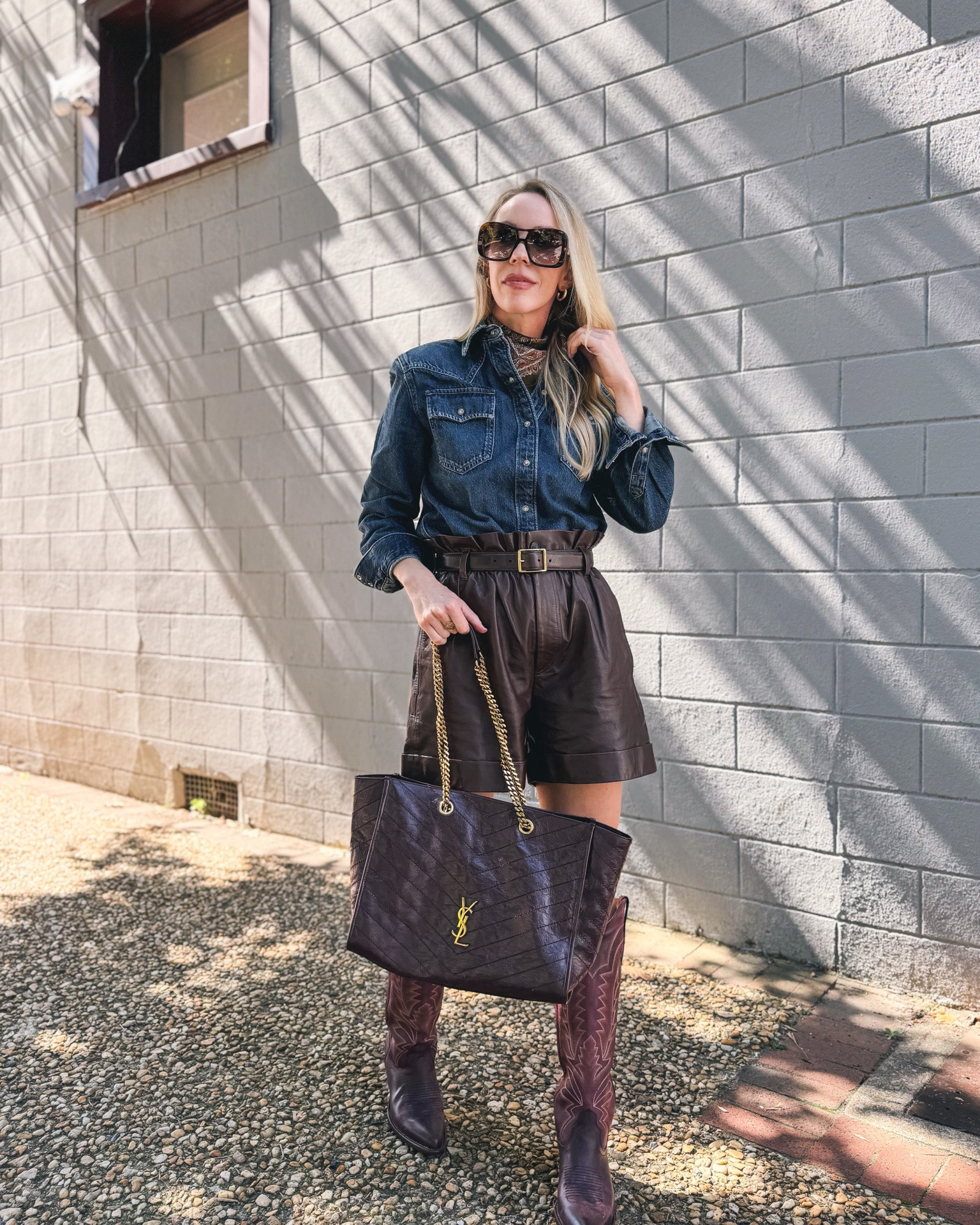 Western chic, @levi shoulder pad denim shirt, paisley silk scarf, leather shorts, @Tecovas burgundy cowboy boots

#LTKSeasonal #LTKOver40 #LTKSaleAlert
