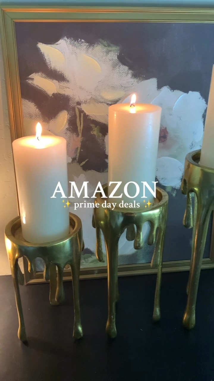 Amazon Prime Day Deals ✨ Spooky Edition 🕯️BACK IN STOCK and over 50% OFF - they couldn’t keep these pillar candle holders in stock last fall and they are stunning and come in silver, black, and the gold you see there! 

follow for more amazon prime day deals | holiday home decor ✨🎃👻🎄

#amazonprimeday #halloweendecorideas #halloweencandles #halloweendecoration #spookydecor

#LTKHome #LTKSaleAlert #LTKSeasonal