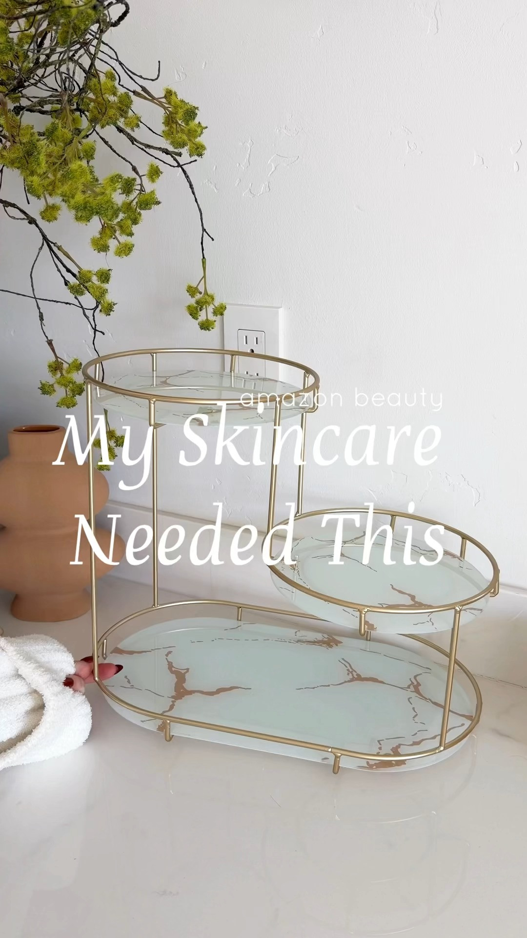 A multi-tiered makeup storage rack feels like a blend of vanity organizer and display piece. Both functional and a little glamorous. it transforms a scattered assortment of products into something orderly and visually pleasing. It’s not just storage, it’s a small stage for the items you use most, framed in gold and always within reach.
 

 #LTKselfcare #LTKBeauty