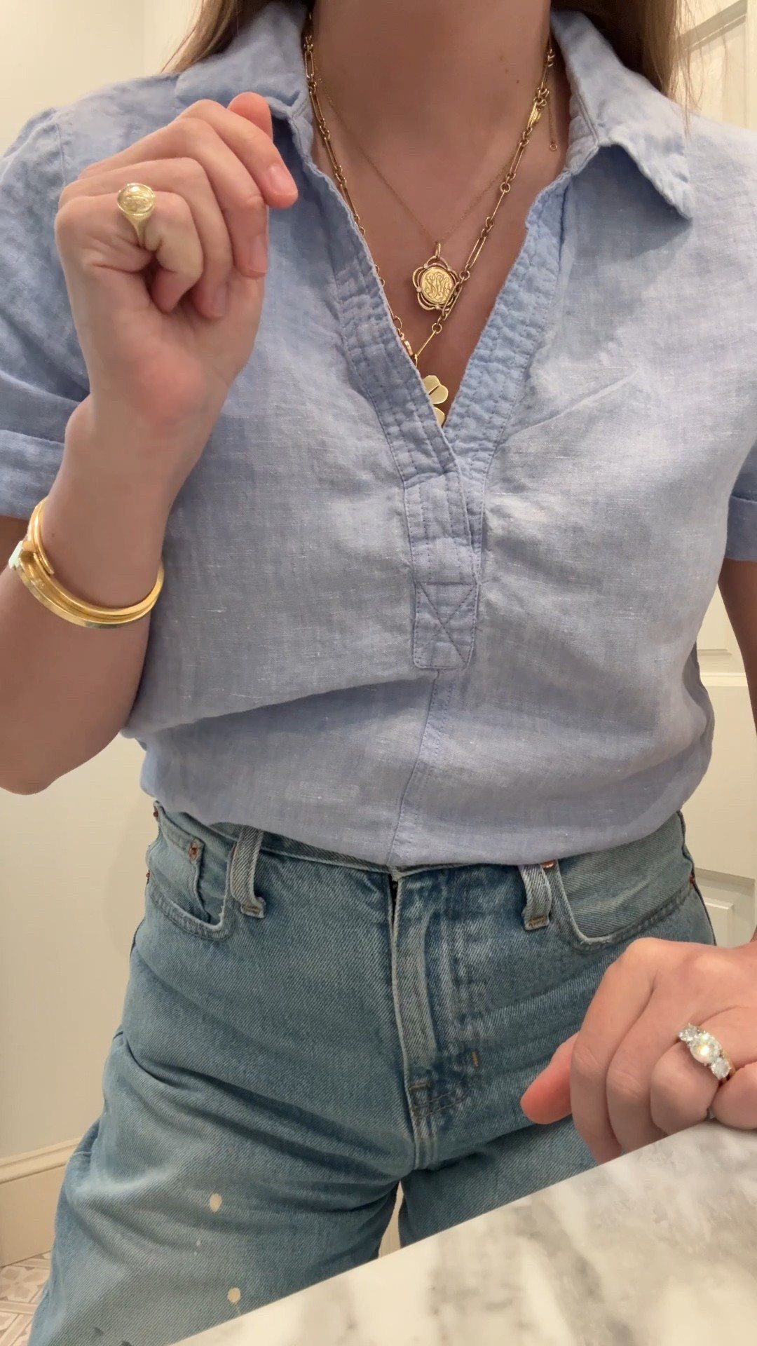  Necklaces and pinky ring are by Aurelia Demark 