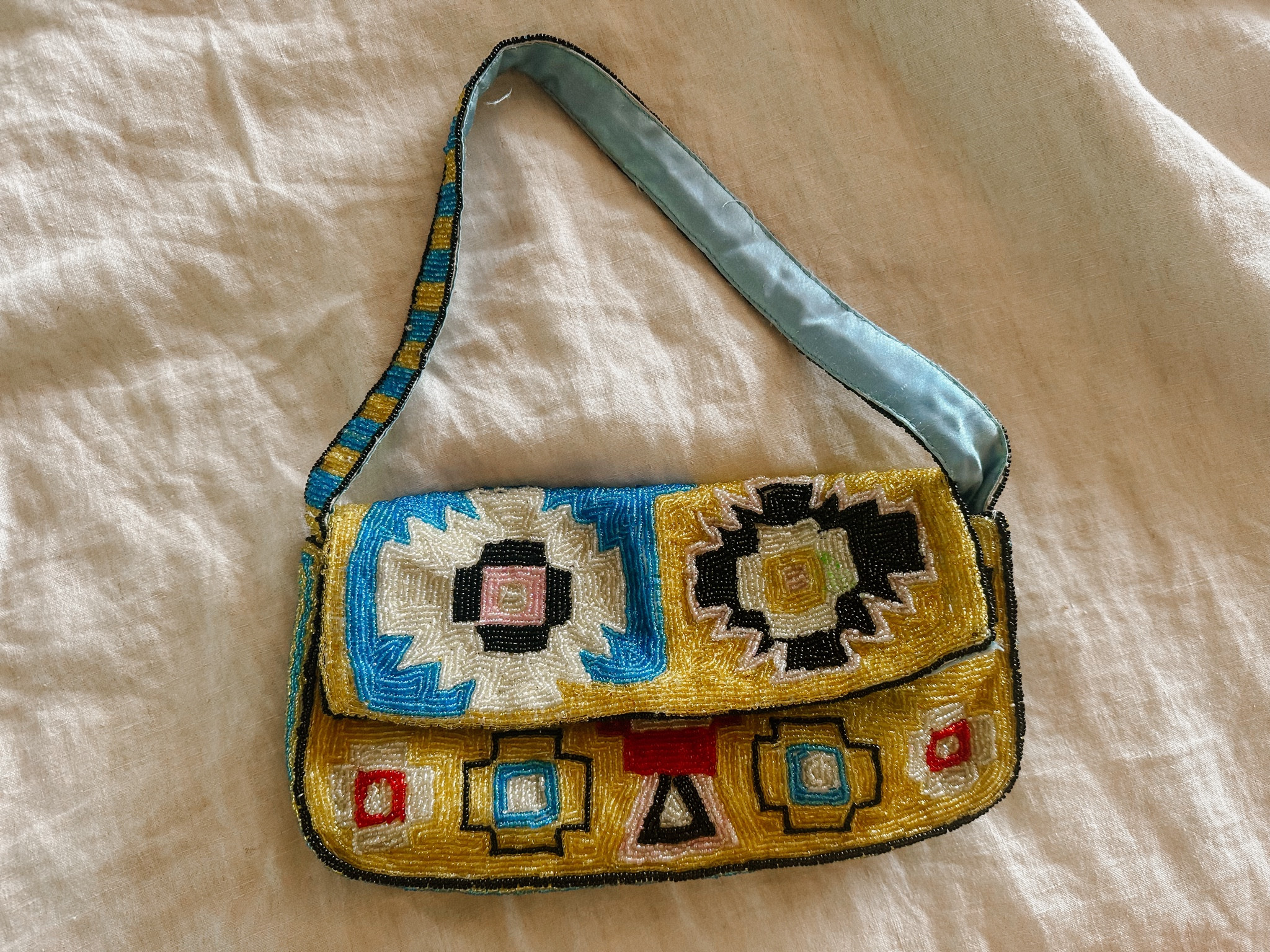 Vintage beaded bags! Love the prints and colors. The Staud Tommy bag is inspired by Christiana bags from the 90s

#LTKItBag