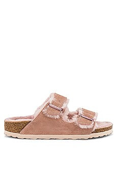 BIRKENSTOCK Arizona Shearling Sandal in Light Rose from Revolve.com | Revolve Clothing (Global)