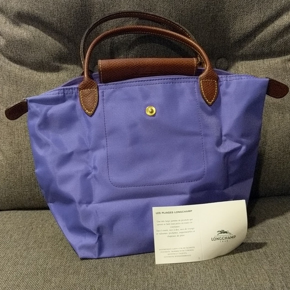 NEVER USED Small purple le pliage longchamp bag | Poshmark