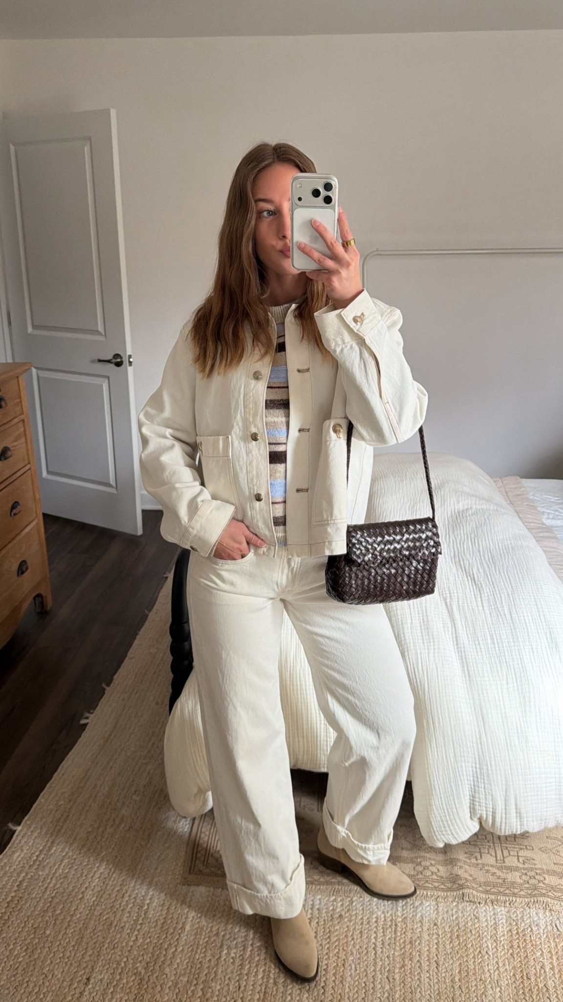 3/28/26 White-on-White Denim Outfit

A fresh spring look I’ve been loving 🤍 a white-on-white denim moment that feels so clean and easy for the season.

Wearing my Madewell denim jacket (size M for an oversized fit) layered over an Abercrombie sweater (size M), paired with my favorite Abercrombie low-rise loose jeans in a light cream wash (size 25 regular, cuffed hem).

Finished the look with my Loeffler Randall woven bag. My boots are older from Steve Madden, so I’ll link a similar pair. Everything is linked here ✨

#LTKSaleAlert #LTKSeasonal #LTKootd