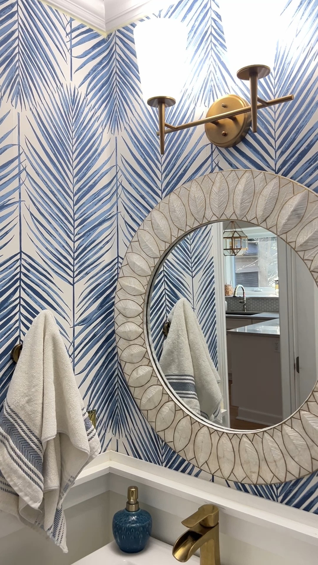 Blue and white palm leaf wallpaper that’s perfect for powder rooms, foyers, bedrooms and more! 

#LTKFindsUnder50 #LTKHome #LTKSaleAlert