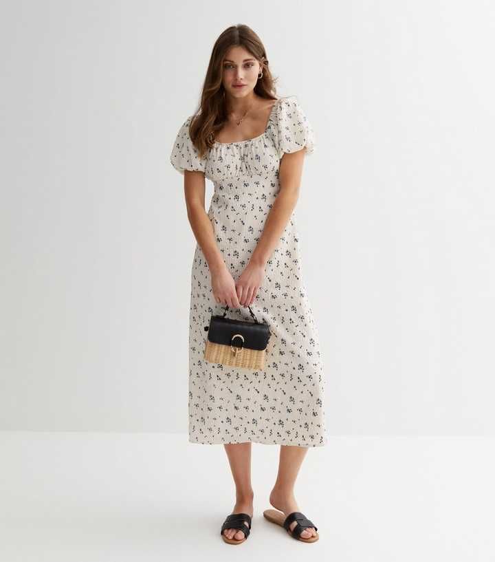White Ditsy Floral Puff Sleeve Midi Dress
						
						Add to Saved Items
						Remove from Saved... | New Look (UK)