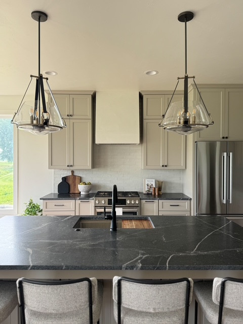 This kitchen nails the modern look with sleek custom cabinets, leathered granite counters, a roomy 8-foot island, and high-end appliances—all chosen to blend style and top-notch performance. #homedecor #interiordesign 

 #LTKHome