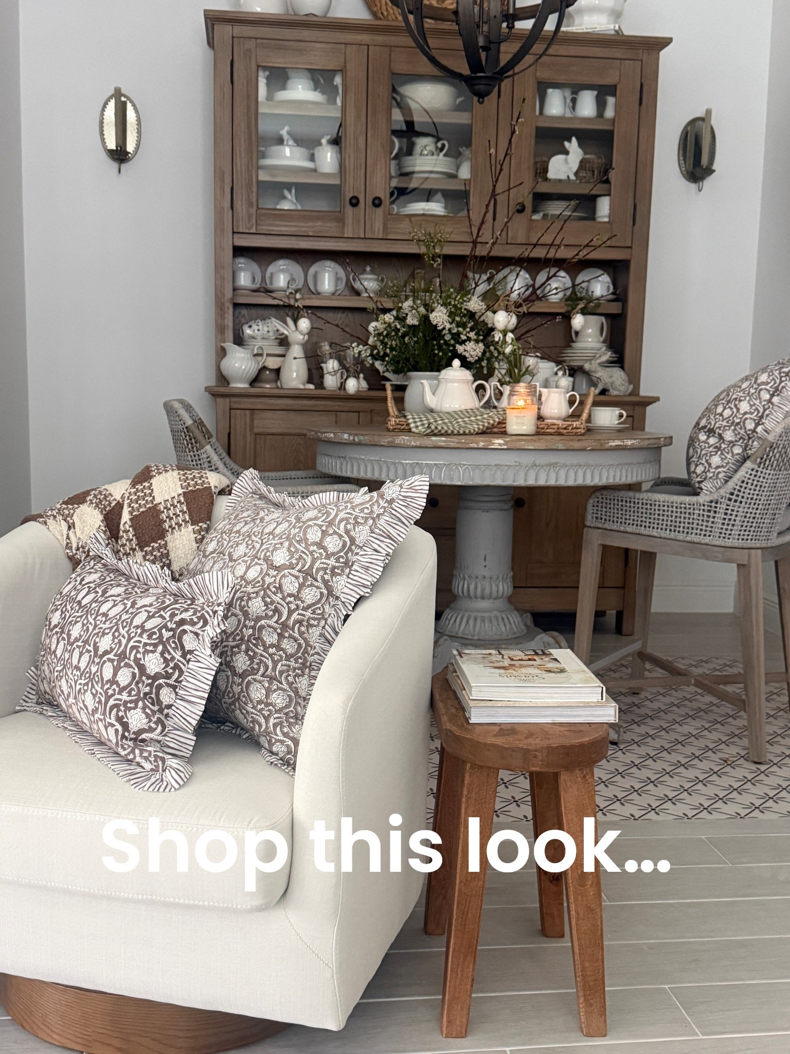 Sharing my cozy corner here.  We just added the mid century barrel chair and block prints throw pillows.  To get that plush full pillow look I like to size up on my inserts.  