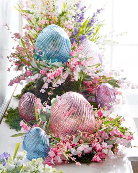 Aren’t these swirl patterned glass Easter eggs perfect for this Spring.  Get multiple sizes for more interest.  They will look beautiful in a tablescape or floral arrangement.  

#LTKhome #LTKSeasonal #LTKstyletip