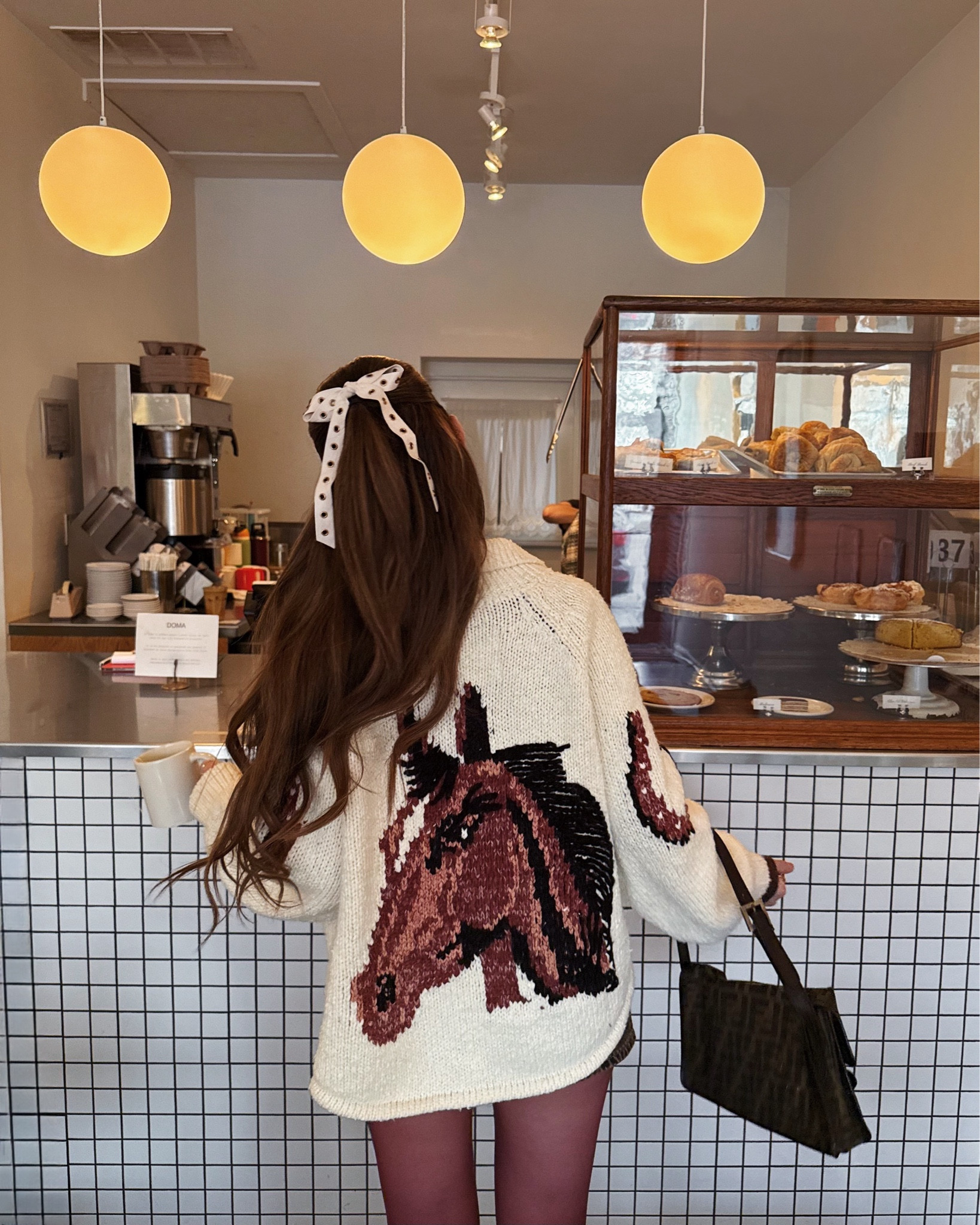 anthropologie horse sweater, oversized chunky knit, studded hair bow, coffee shop outfit, burgundy sheer tights, easy casual winter outfit 

#LTKSeasonal #LTKFindsUnder100 #LTKHoliday