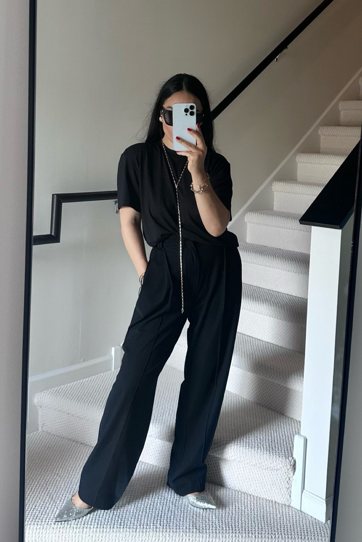 Wardrobe staples 
Loose fit Black tee, for my regular size 
Chic trouser, normal size (the pleats are on point) 
Elevate this look with fun earrings :)) 

#LTKstyletip #LTKworkwear