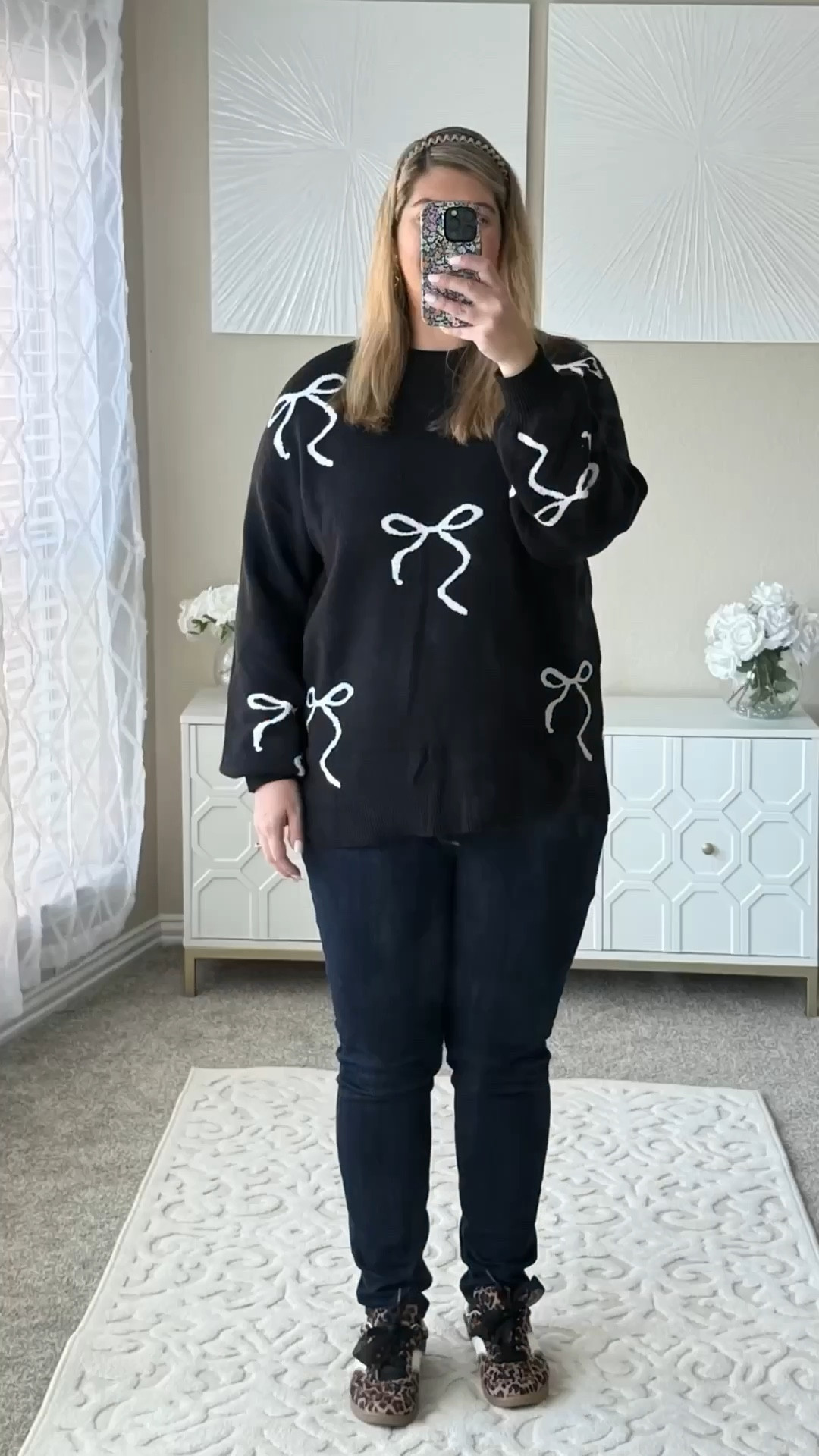 This oversized black knit sweater with white bow print is such a standout right now. Bow sweaters are super trendy, and this one nails the cozy-but-cute look with an easy oversized fit that feels comfortable without looking sloppy.
Style it with jeans and sneakers for casual days, leggings for errands, or dress it up with a mini skirt and boots for an on-trend outfit. Soft, cozy, and an easy piece to wear all season.

bow sweater, oversized knit sweater, black bow sweater, cozy casual pullover, trending bow sweaters, everyday fall outfits

#LTKPlusSize #LTKMidsize #LTKFindsUnder50