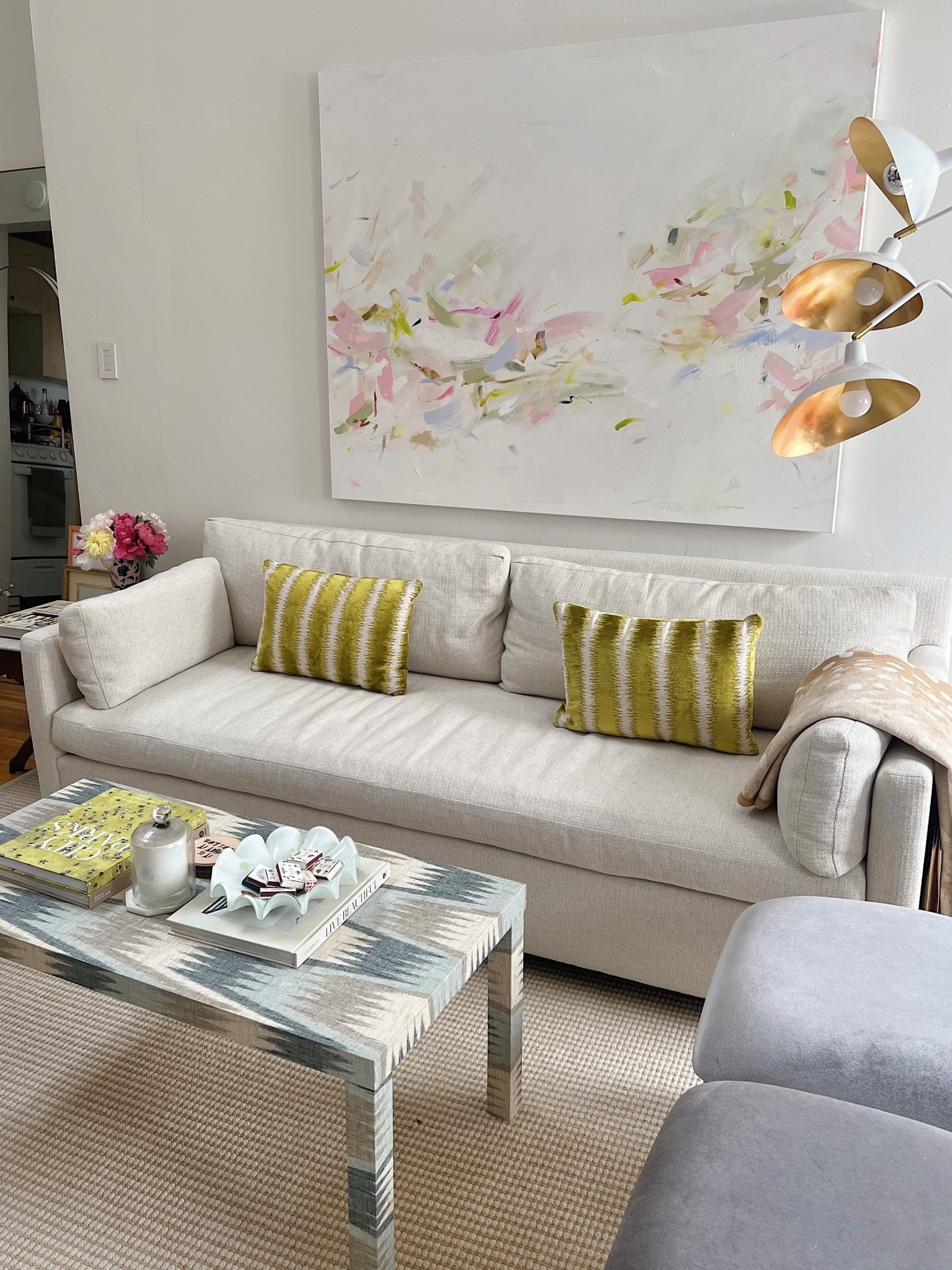 Sooo happy with our apartment refresh! Perfect for spring! Linking our couch, fun throw pillows, similar abstract art, and other home accessories in our small apartment

#LTKHome #LTKFindsUnder100