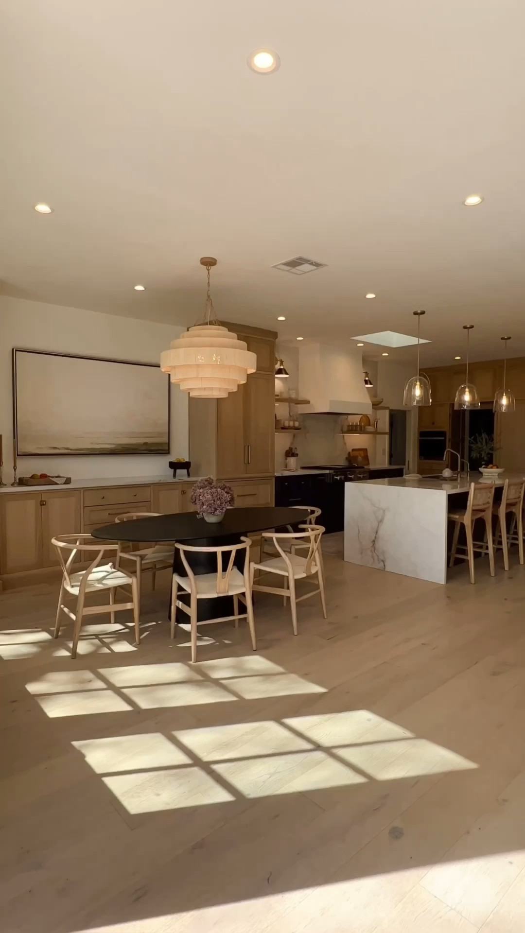 Open floor plan. Living room furniture, Amazon, rattan chandelier, roped chandelier, woven counterstools, counter stools, glass pendant lights, wishbone chairs.

#LTKsalealert #LTKstyletip #LTKhome