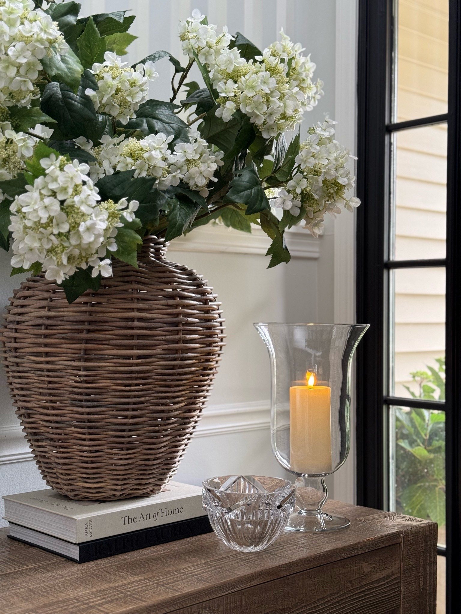 Pottery Barn came out with a new version of this retired woven vase. Linked new version.

#LTKHome #LTKSeasonal