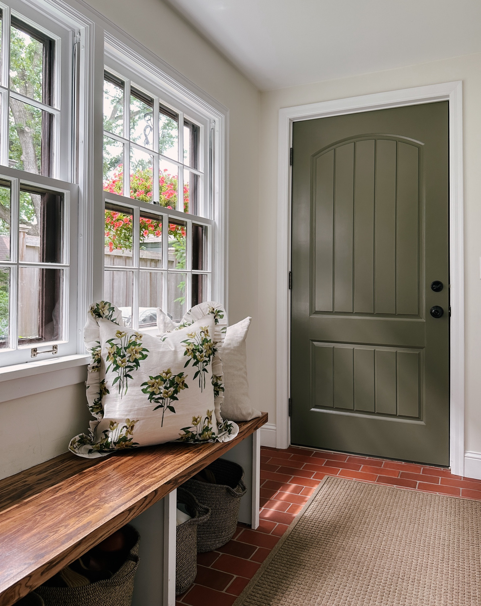 new mudroom door color & styling 😍. this is the prettiest pillow cover and can’t recommend this waterhog runner enough. practical, durable and easy on the eyes compared to other utilitarian runners. baskets are no longer available but linking something similar  

#LTKHome #LTKStyleTip