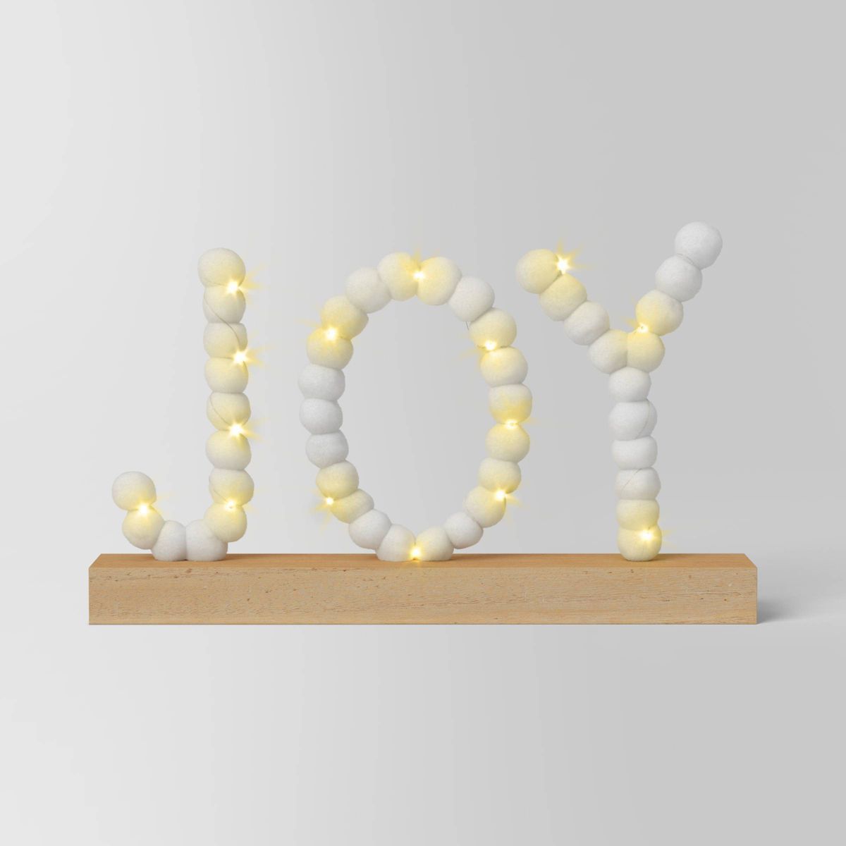 7.75" Battery Operated LED Lit 'JOY' Pom Pom Tabletop Christmas Decorative Sign - Wondershop™ | Target