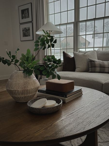 Round coffee table decor for spring. 

Simple coffee table styling, spring decor, coffee table books, throw pillows, sectional couch, crate & barrel lounge deep, target home, target style, affordable spring decor, H&M home decorr

#LTKhome #LTKSeasonal