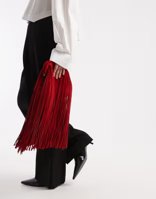 ASOS DESIGN fringed clutch bag in red suede | ASOS (Global)
