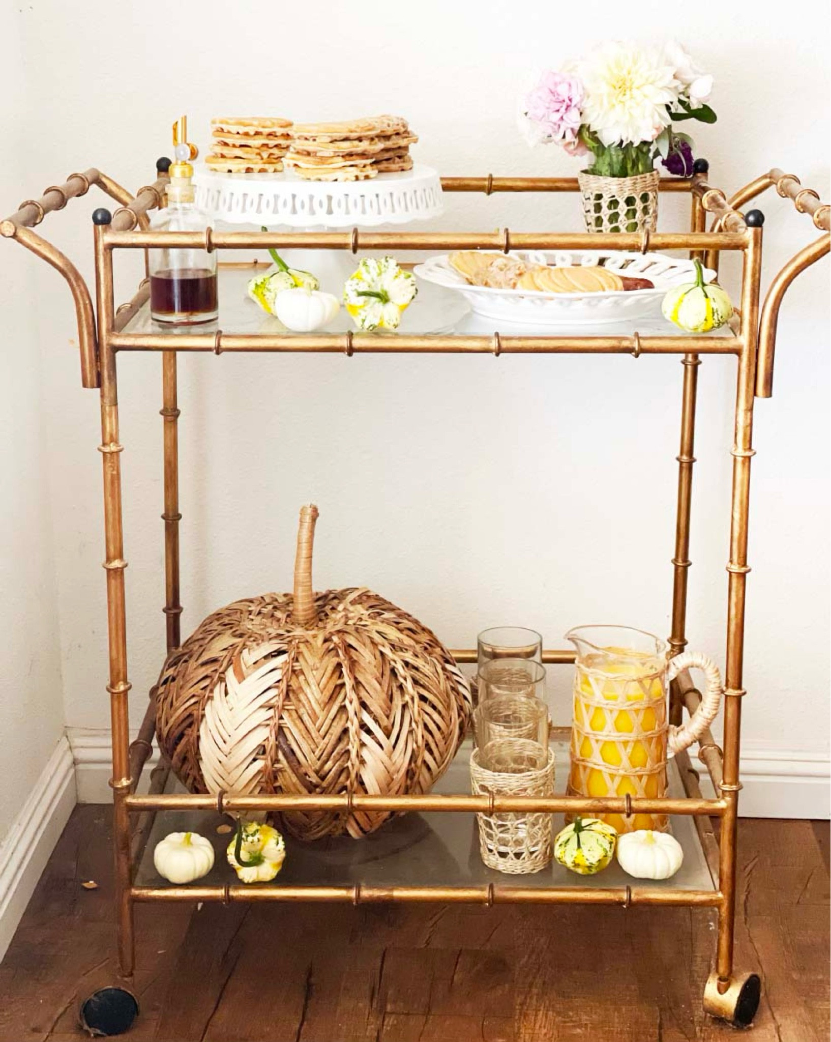 Fall bar cart. Pumpkin shape pancakes, woven pumpkin, rattan decor. Friendsgiving breakfast. Thanksgiving Breakfast. Fall brunch. Autumn breakfast.  Halloween breakfast. Halloween decor. 🧇🧡🎃🍁🥰

#LTKSeasonal #LTKHalloween #LTKhome