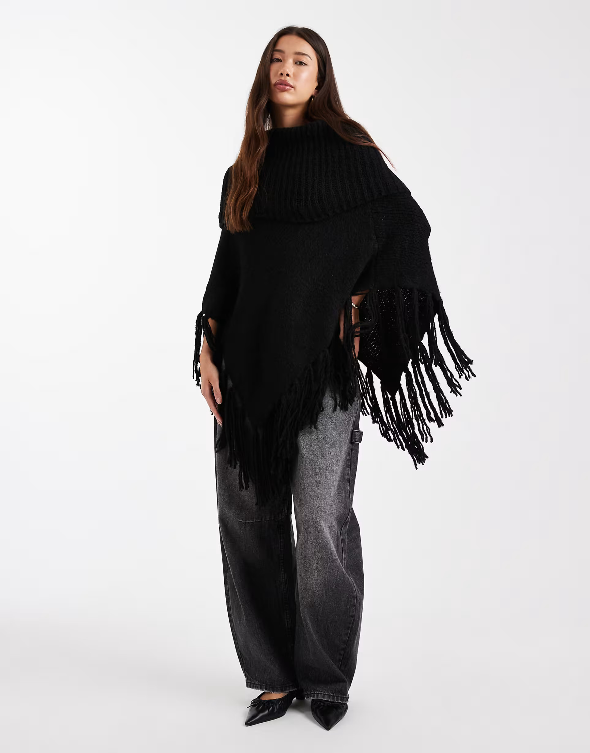 ASOS DESIGN knitted poncho with tassel fringe in black | ASOS (Global)