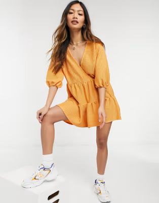 ASOS DESIGN oversized tiered playsuit in biscuit | ASOS (Global)