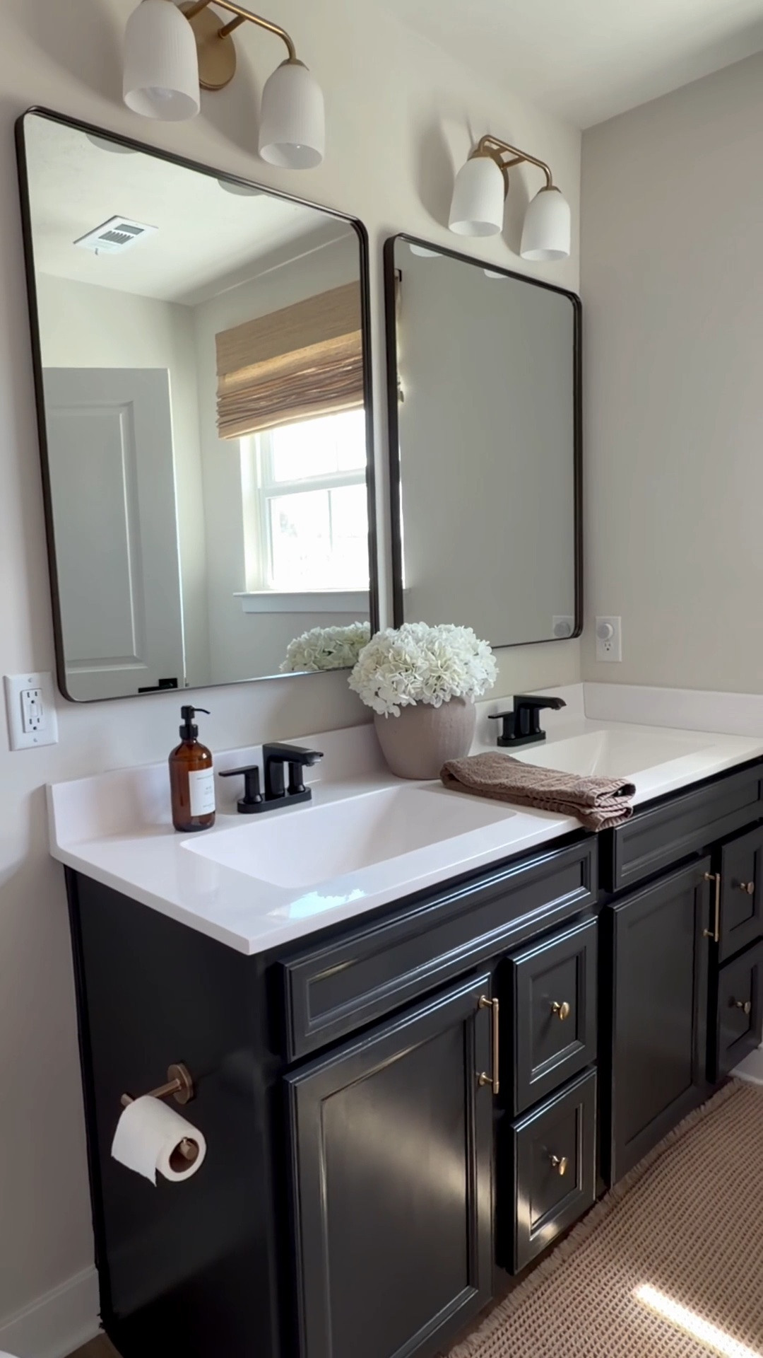 Bathroom renovation, champagne bronze hardware, handles, pulls, knobs, bronze mirror, rectangle mirror, waterfall shower head, black shower head, gingham shower curtain, champagne bronze lighting, champagne bronze toilet paper holder, bath towel, brown towels, tan vase

#LTKSaleAlert #LTKHome #LTKOver40