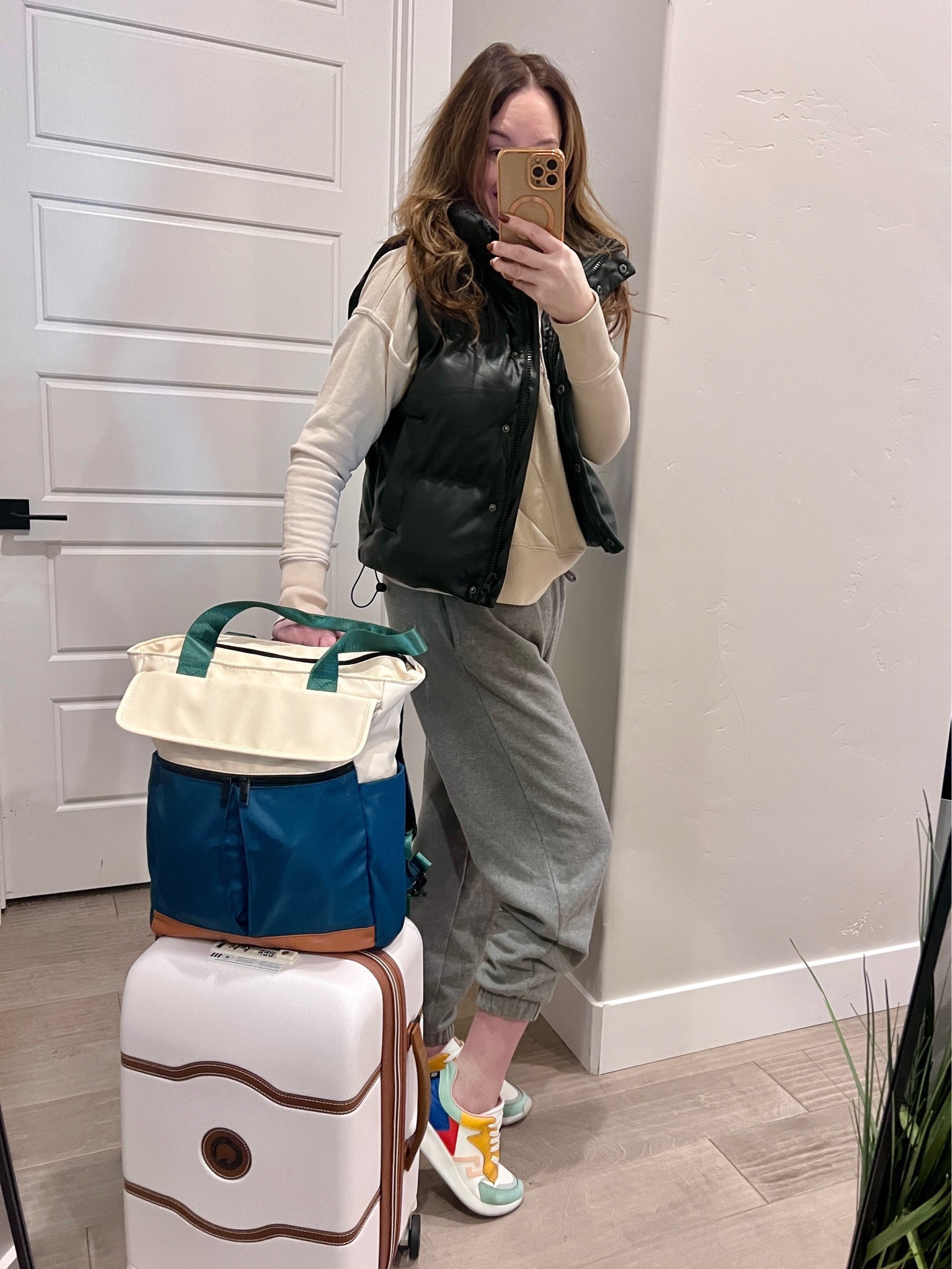🌍✈️ Travelers, let's chat! Who says you can't look stylish and feel comfy on a long flight? 😎 For my over 40 ladies, I've got you covered with this casual yet chic travel outfit featuring my favorite @delseyparisusa luggage. 💼 I'm rocking comfy sweats, a puffer vest, and a pullover sweatshirt with my go-to sneakers so I can hustle through the airport if I need to. 🏃‍♀️ What's your go-to plane outfit? Drop a comment below and let's talk travel style! 🧳 #TravelInStyle #Over40Style #ComfortableAndCasual #PlaneOutfit #DelseyParis #RunThroughTheAirport #TravelFashion #PufferVest #SneakerStyle 🌟

#LTKunder50 #LTKstyletip #LTKtravel
