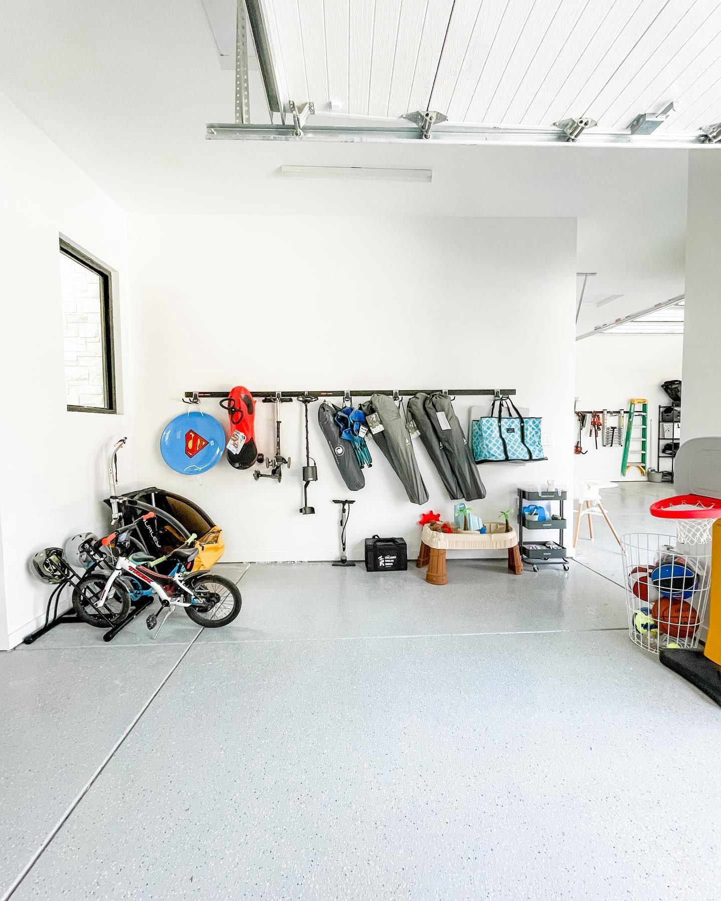 What does one do when they’ve run out of indoor spaces to organize?!

They take it outside! We loved planning out this garage system and getting it installed right before that summer weather hits! 🌞 And by golly, I think it has this week!
