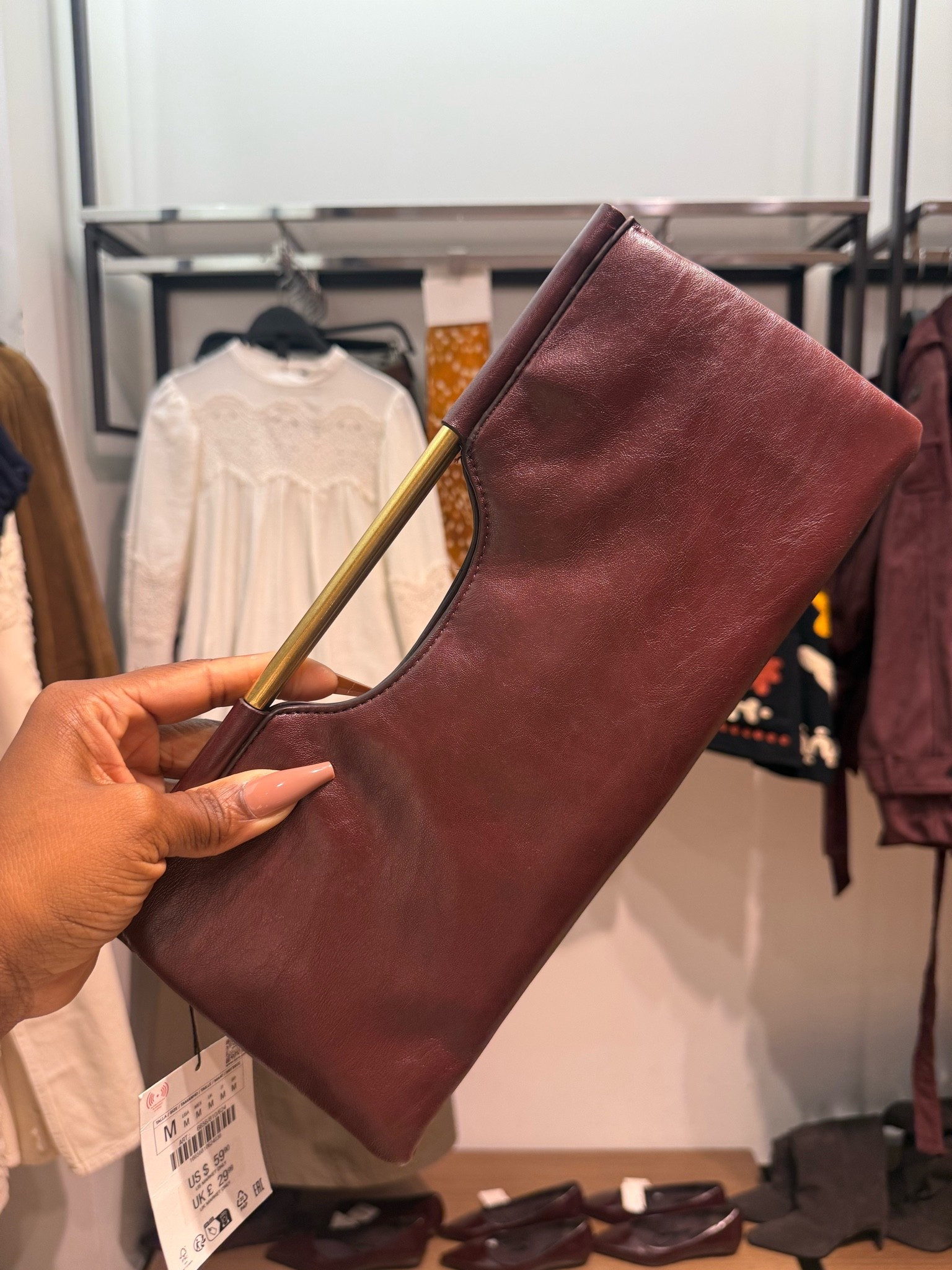 Burgundy clutch with gold handle

#LTKSeasonal #LTKOver40