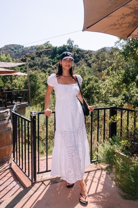 White maxi cotton eyelet dress with a baseball cap to pair ✨ maxi dress, La dad cap, street style, black and white style 

#LTKstyletip