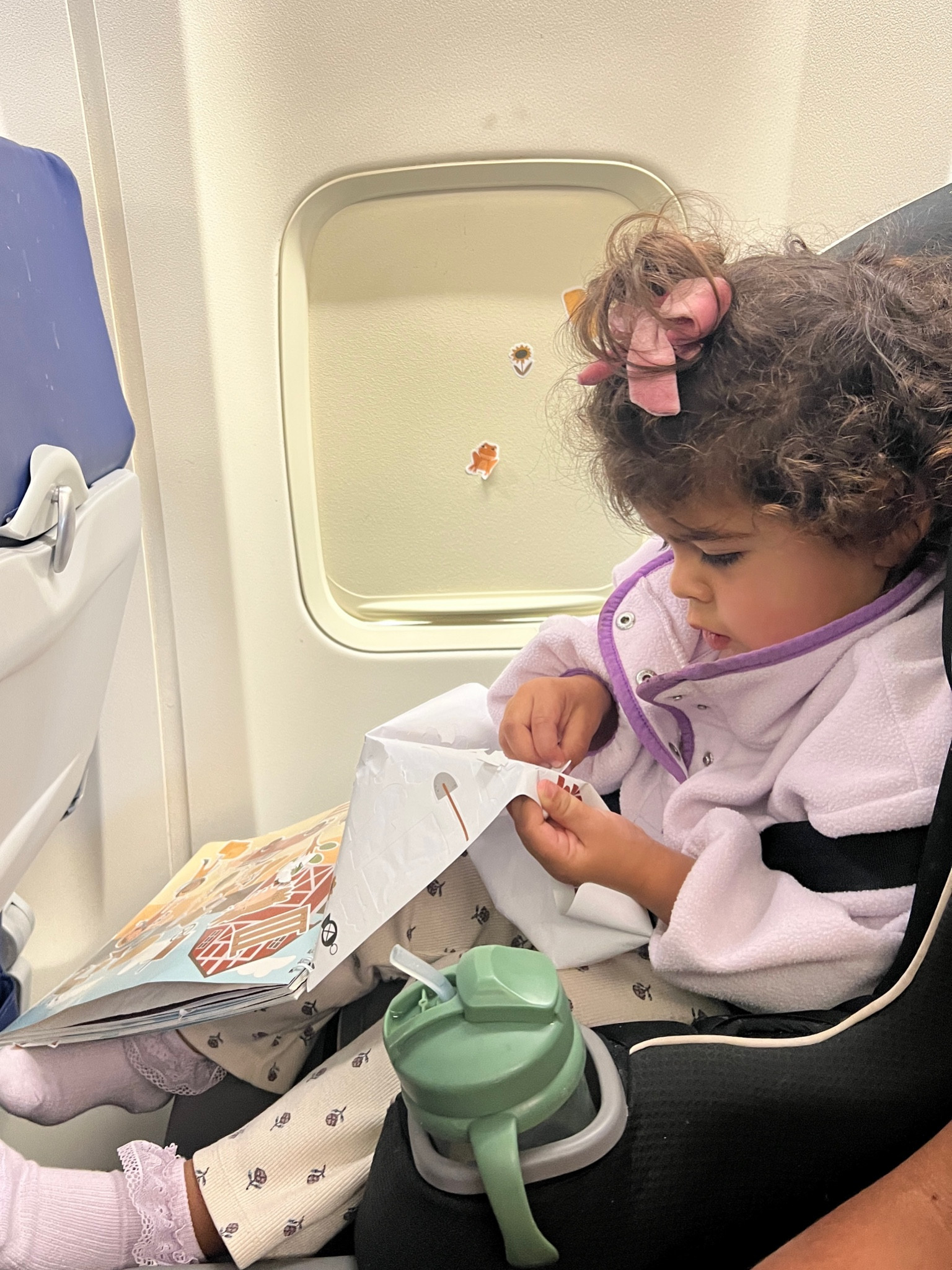 We love our sticker book for flights and restaurants 

#kidstravel