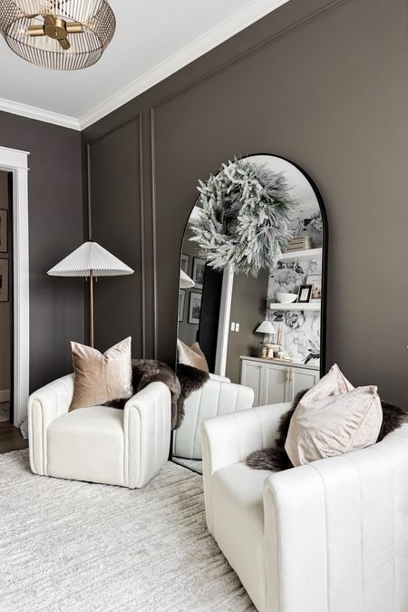 Another new find that made the top 20 list for 2023!

Home  Home finds  Trending home  Arched mirror  Mirror  Home office  Accent chair  Throw pillow  Floor lamp  Lighting  Area rug  Wreath

#LTKhome #LTKSeasonal