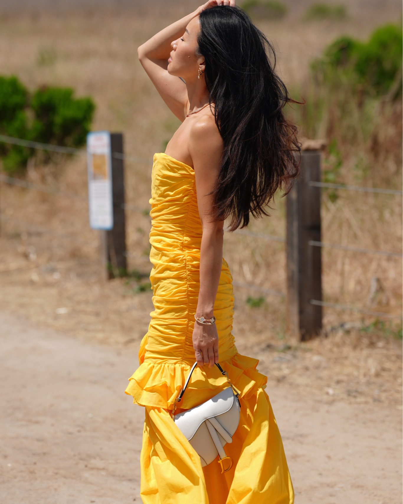Wedding season is here and this is the perfect wedding guest dress! Love the shade of yellow, and the ruching and flower detail. Wearing size 0 for reference.

Bag is Dior and borrowed from Vivrelle. Love how I can borrow luxury, designer bags, jewelry and watches every month. Get one FREE month when you use code CHRISTINEKONG.

#LTKWedding #LTKootd #LTKOver40
