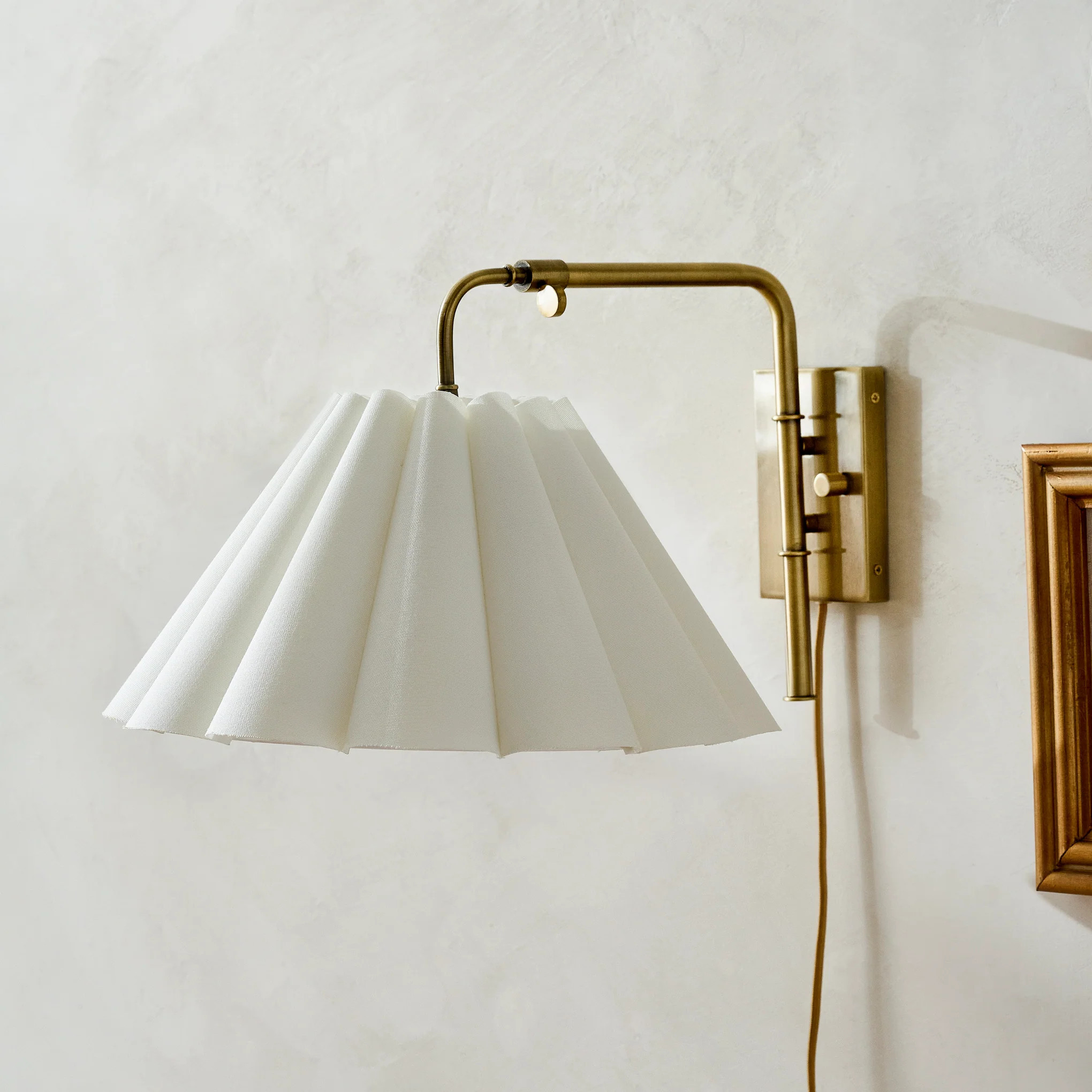 Odette Swivel Plug-In Sconce with White Linen Scallop Shade | Magnolia