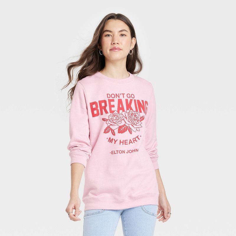 Women's Elton John Breakin' My Heart Graphic Sweatshirt - Light Pink | Target