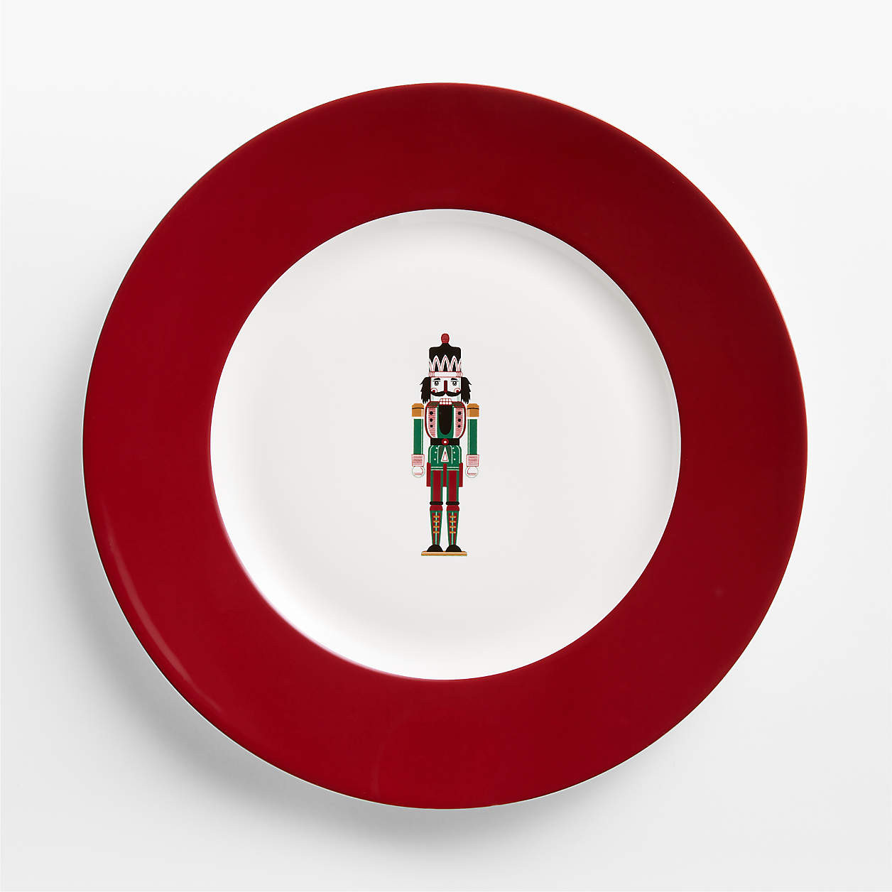 Aspen Red Rim Nutcracker Porcelain Dinner Plate | Crate & Barrel | Crate & Barrel