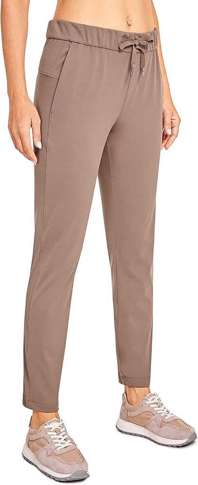 CRZ YOGA Women's 4-Way Stretch 7/8 Ankle Pants - 25"/27.5"/29" - Drawstring Tapered Comfort Trave... | Amazon (US)